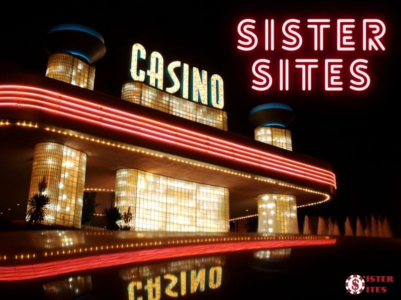 UK casino sister sites image with a glowing playhouse.